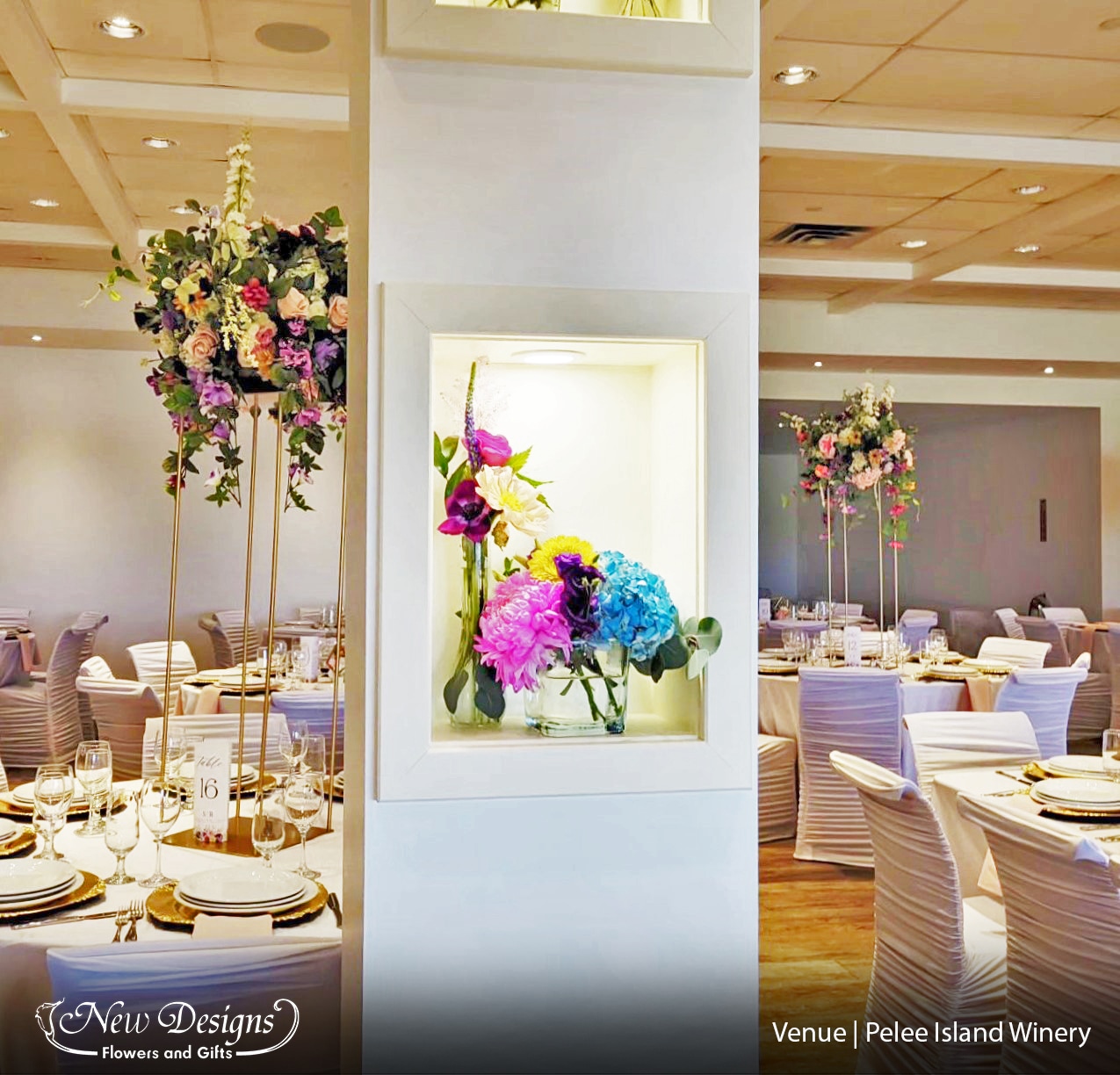 Alcove installments at pelee island winery, with bright colourful summery flowers in yellows pinks blues purples and oranges
